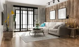 Soggiorno moderno con divano beige, tavolino in legno, tappeto grigio e parete effetto legno. Un esempio di come ristrutturare casa a costo zero con stile.