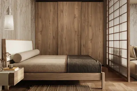 Camera da letto in stile japandi con letto basso, armadio in legno e divisorio shoji.