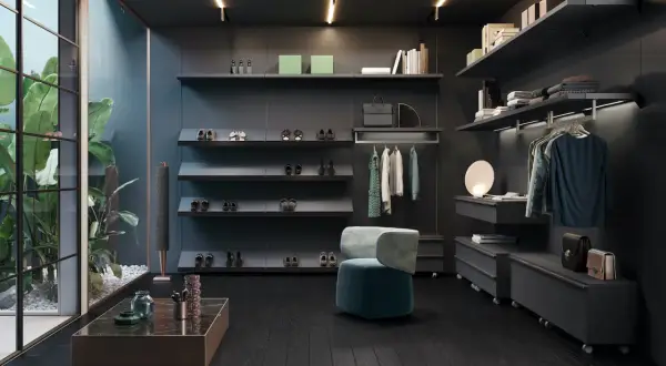 Armadio moderno con ripiani a vista per organizzare scarpe e vestiti. Soluzione elegante per organizzare armadio senza cassetti, con pouf e piante.