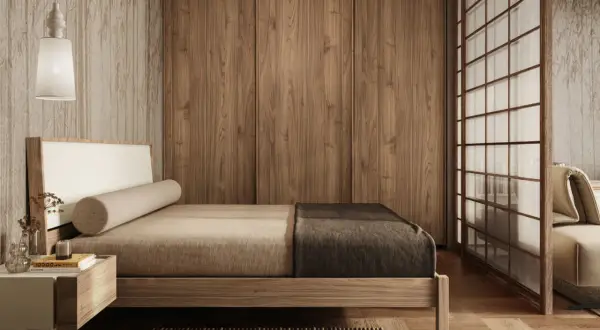 Camera da letto in stile japandi con letto basso, armadio in legno e divisorio shoji.