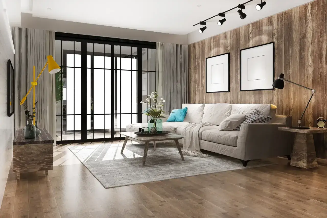 Soggiorno moderno con divano beige, tavolino in legno, tappeto grigio e parete effetto legno. Un esempio di come ristrutturare casa a costo zero con stile.
