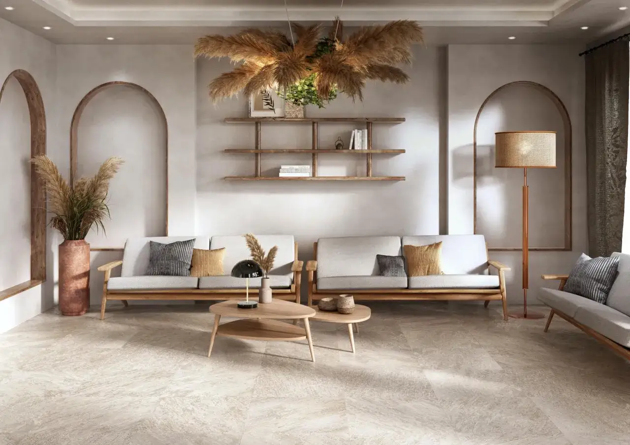 Salotto con divani chiari, tavolini in legno e un'atmosfera boho chic arredamento con erbe della pampa.